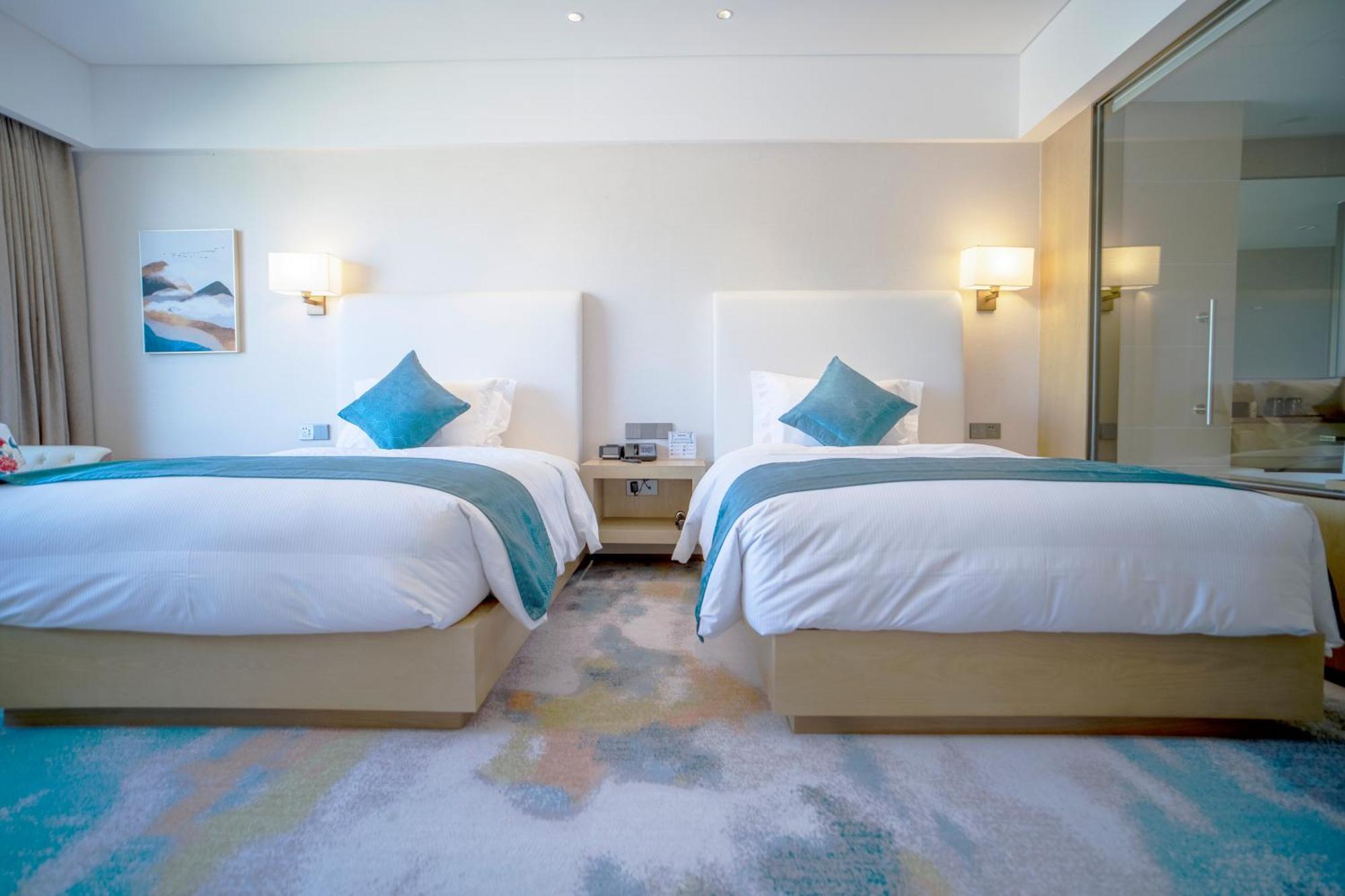 מלון ליג'יאנג Hilton Lijiang מראה חיצוני תמונה